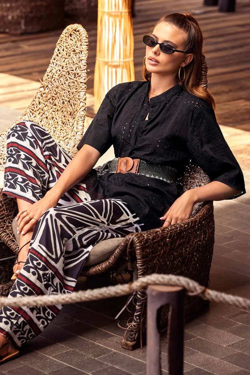 ICONIQUE | Pantalone palazzo fantasia geometrica