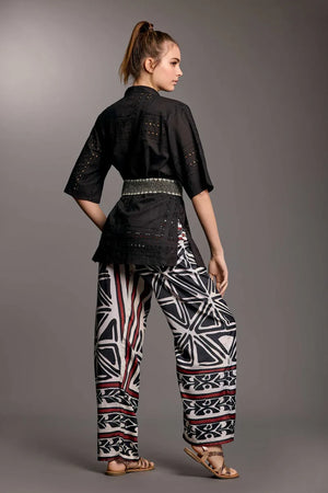 ICONIQUE | Pantalone palazzo fantasia geometrica