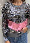 Pull girocollo con macropailettes