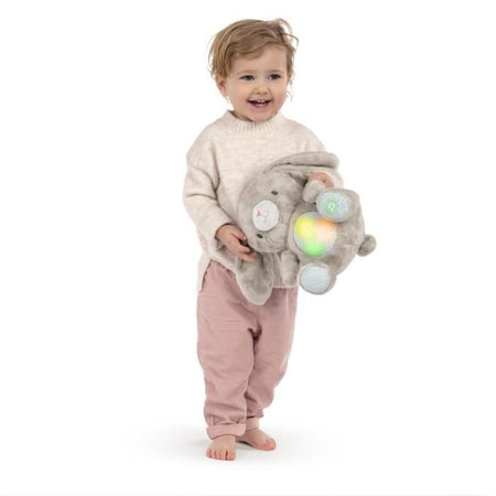 INGENUITY Sylvi, peluche a forma di coniglietto, melodie e vibrazioni rilassanti, luminoso, regalo di nascita