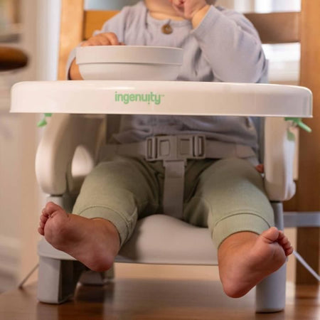 Asiento elevador plegable INGENUITY Deluxe gris, portátil con bandeja y correas incluidas