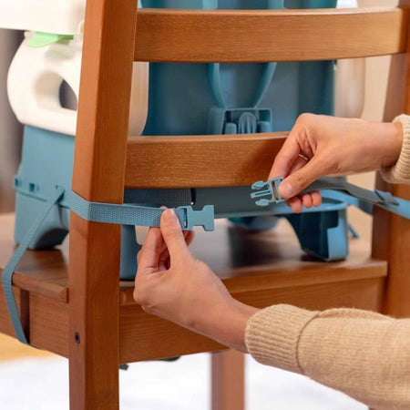Seggiolino rialzato pieghevole Deluxe INGENUITY Turchese, portatile con vassoio e cinghie incluse