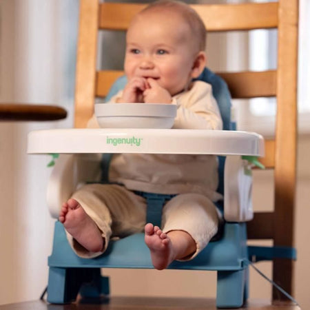 Seggiolino rialzato pieghevole Deluxe INGENUITY Turchese, portatile con vassoio e cinghie incluse