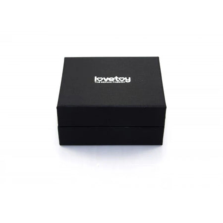 Plug Anale LoveToy metallo pesante color oro pietra verde confezione regalo