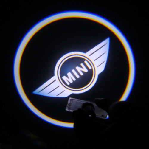 KIT LUCI LED LOGO PROIETTORE MINI COOPER A BATTERIA CON SENSORE MAGNETE UNIVERSAL