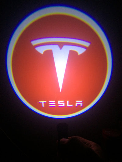KIT LOGO LED PROIETTORE SOTTOPORTA BATTERIA TESLA UNIVERSALE AUTO