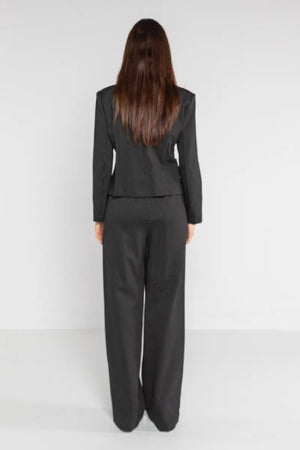 LOKITA | Pantalone elastico in tessuto gessato