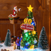 Villaggio di Natale, Albero e Babbo che lo decora in movimento, h 22 cm