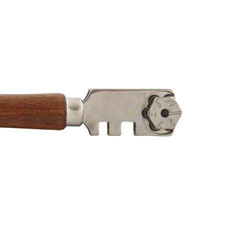 Tagliapiastrelle composto da una rotella e un manico realizzato in legno