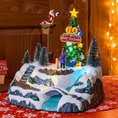 Villaggio di Natale, Albero e Babbo che lo decora in movimento, h 22 cm