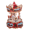 Statuetta giostra con carillon in resina H16 cm per decorazioni natalizie