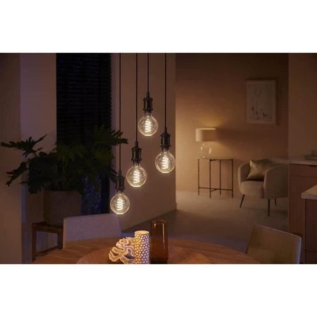 Philips Hue White Ambiance, LED Connected LED E27 Filament G93 Globe, Bluetooth, lavora con Alexa, Google e HomeKit