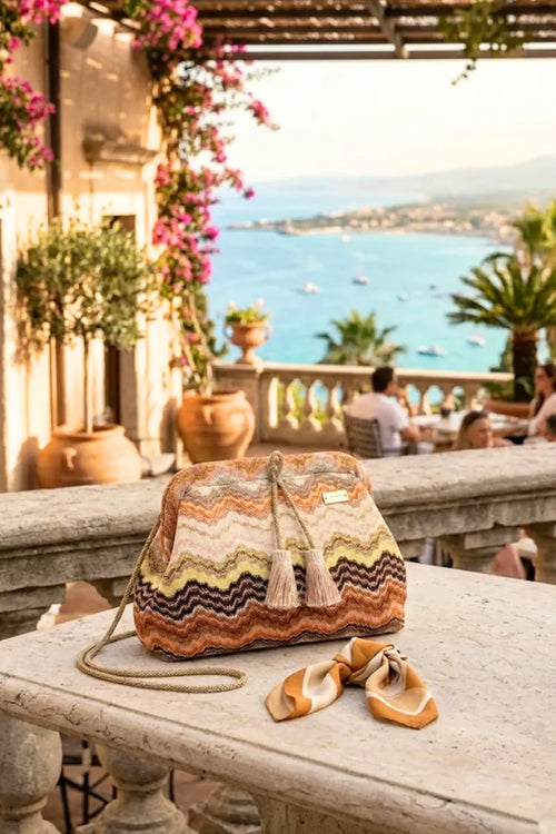 Pochette fantasia con filo strass e nappine | PHO Firenze