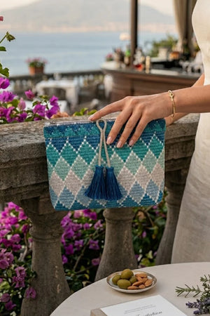 Pochette fantasia con filo strass e nappine | PHO Firenze