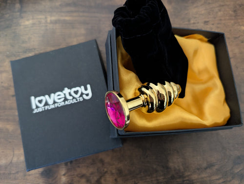 Plug Anale LoveToy metallo pesante color oro gioiello fuxia confezione regalo