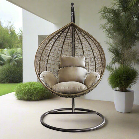 Poltrona a dondolo sospesa "Amirantes" per giardino e veranda in rattan con cuscino