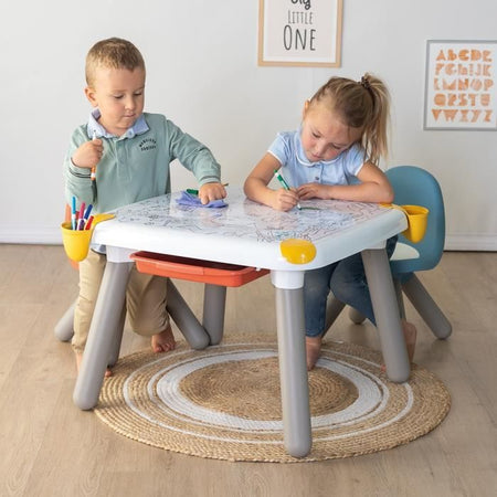 Smoby - Tavolo creativo per bambini - Feltro cancellabile per il tavolo + 2 fogli grandi da colorare - 3 vani portaoggetti - Dai 3 anni in su