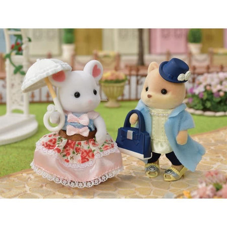 SYLVANIAN FAMILIES Valigia per cani caramello alla moda e sorella maggiore per bambini