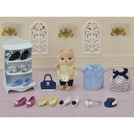 SYLVANIAN FAMILIES Valigia per cani caramello alla moda e sorella maggiore per bambini