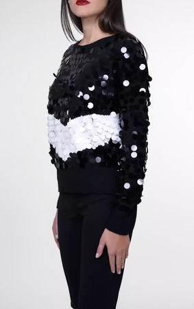 Pull girocollo con macropailettes