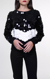 Pull girocollo con macropailettes