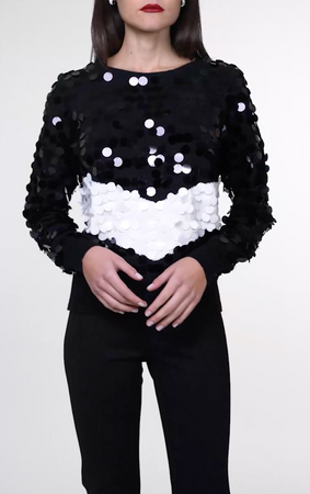 Pull girocollo con macropailettes