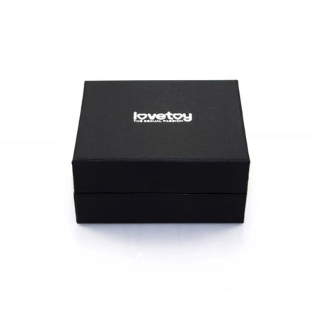 Plug Anale LoveToy metallo pesante color oro con pietra blu in confezione regalo