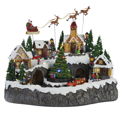 Scena animata a Led con negozi e babbo natale con renne con luci 40 cm