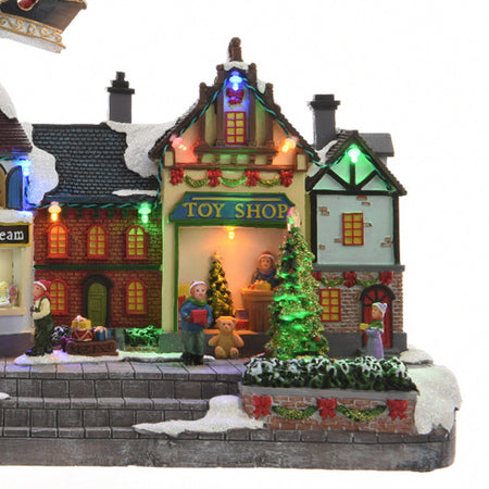 Scena animata a Led con negozi e babbo natale con renne con luci 27 cm