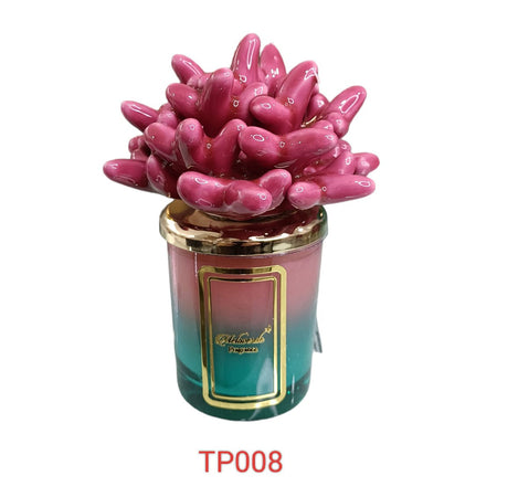 Candela piccola in ceramica bicolore fucsia anemone Melaverde da 100gr, decorata a mano, con scatola regalo elegante inclusa.