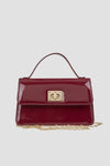 VERDE FASHION | Pochette con patta in ecopelle verniciata