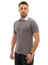 Corneliani Polo grigio con bottoni e taschino da uomo