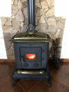Stufa a legna Parlor 6 kW in ghisa con inserti ottone caminetto vintage