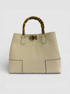 DOPPIASE Borsa artigianale Made in Italy in vera pelle martellata con manici in bamboo naturale 38x27x13cm