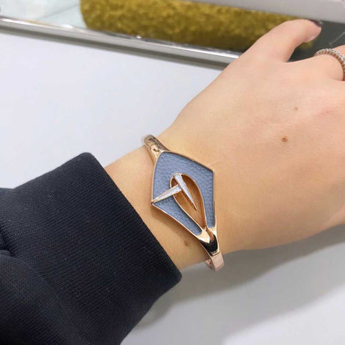 Bracciale Orbital Aurora Alexarte artigianale, design avvolgente con cristalli e placcature in oro e argento, confezione elegante