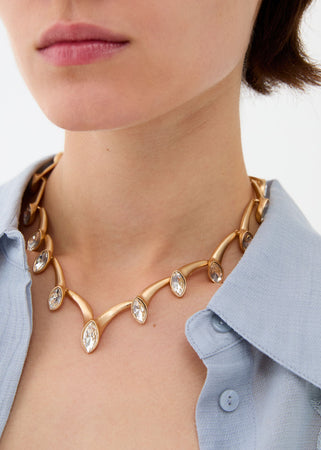 Collana girocollo con elementi e pietre oro