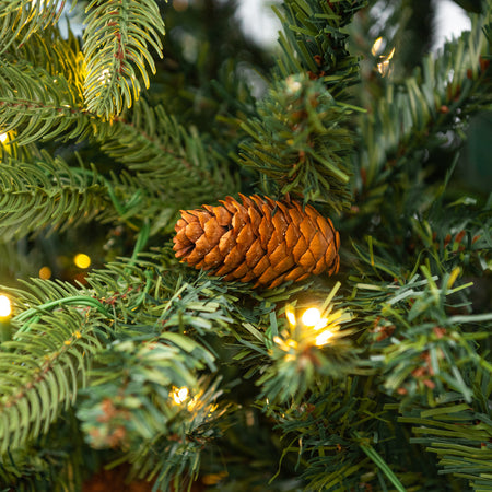 Albero di Natale con base tronco e luci led "Marmolada" in PE Effetto Real Touch+ PVC