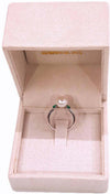 Anello donna in Oro bianco 18 Kt e perla centrale e pietre tipo Smeraldo