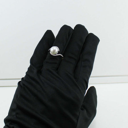 Anello donna oro bianco perla Australiana bianca 10 mm con diamanti Coscia