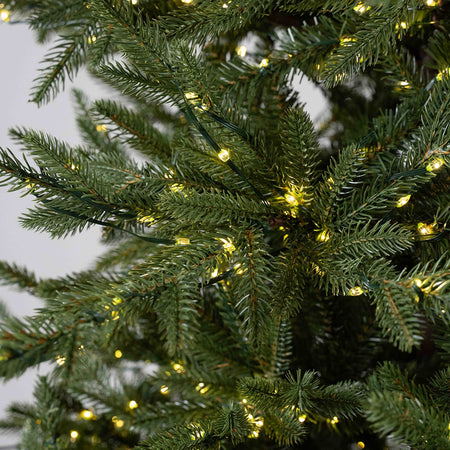 Albero di natale "Tonale" con Led e Tronco Marrone 80% PE Effetto Real Touch