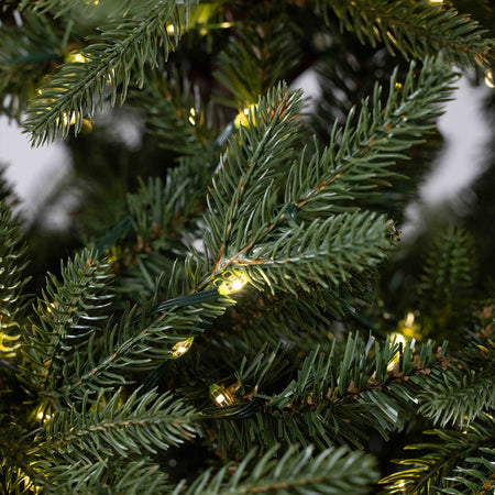 Albero di natale "Tonale" con Led e Tronco Marrone 80% PE Effetto Real Touch
