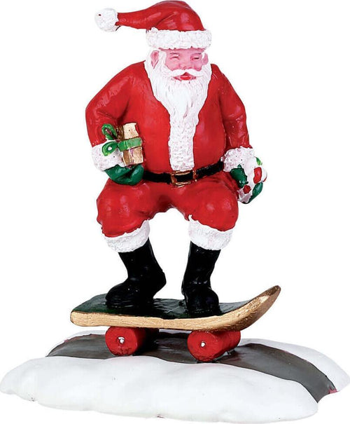 Babbo sullo Skateboard, personaggio per villaggio di Natale in Poliresina Casa e cucina/Decorazioni per interni/Addobbi e decorazioni per ricorrenze/Decorazioni natalizie/Oggettistica MagiediNatale.it - Altamura, Commerciovirtuoso.it