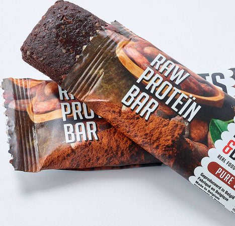 Barretta proteica crude con cioccolato 30 g. con cioccolato belga