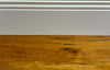 Battiscopa-PREMIUM-in-legno-MASSELLO-mod.DUCALE-91x15-laccato-bianco-liscio-(prezzo-al-metro)