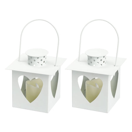 Set 2 lanterne e 2 candele a led con cuori traforati per decorazioni da interno.