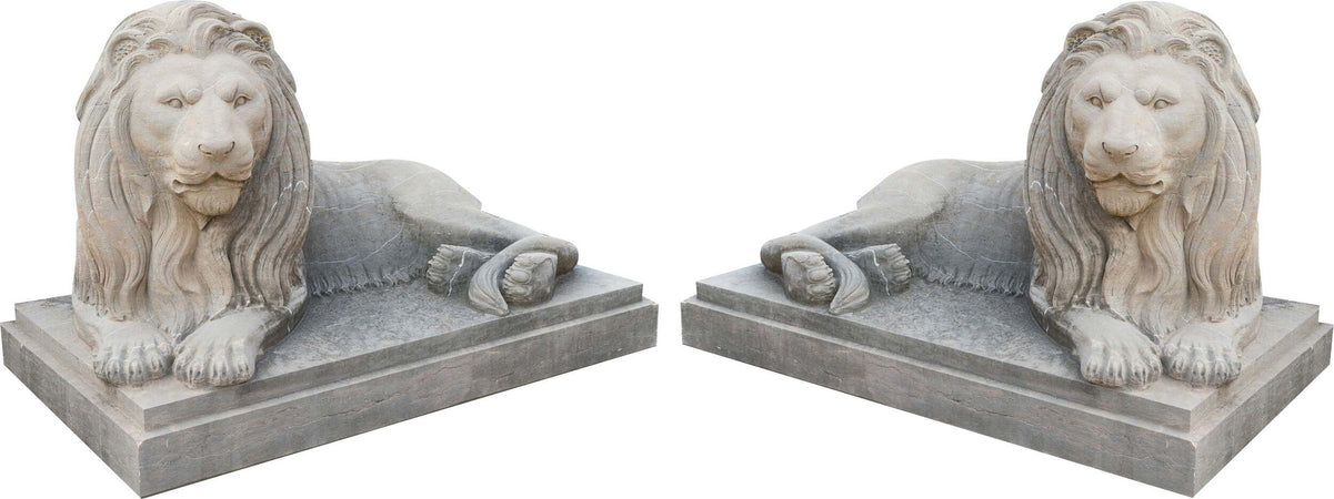 Biscottini-Vecchia-statua-raffigurante-una-coppia-di-leoni-in-pietra