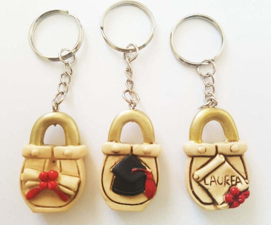 BOMBONIERE LUCCHETTO LAUREA CERAMICA PORTAFORTUNA CONFETTI PORTA CHIAVI CHIAVE Casa e cucina/Hobby creativi/Materiali per hobby creativi/Forniture per feste/Bomboniere Trade Shop italia - Napoli, Commerciovirtuoso.it