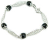 Bracciale Su Coccu e rombi traforati in filigrana sarda argento portafortuna Sardegna