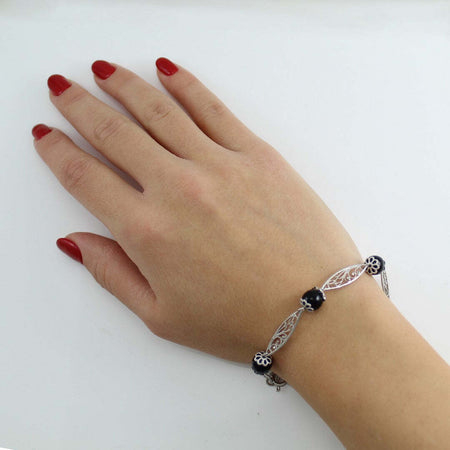 Bracciale Su Coccu e rombi traforati in filigrana sarda argento portafortuna Sardegna