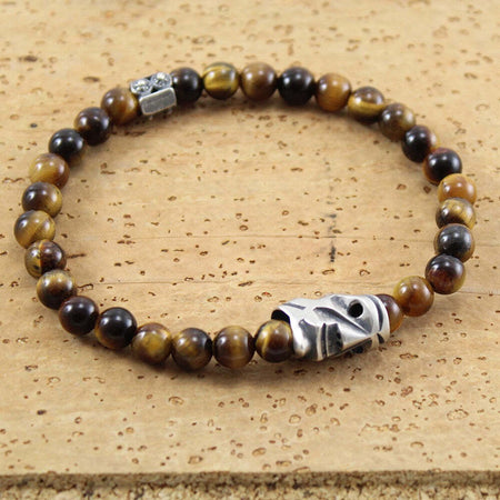 Bracciale elastico maschera sarda Mamuthones in argento e occhio di tigre